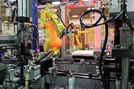 Vision guided pick-and-place robotic cell as part of an automated propane torch assembly system. (Courtesy of Edgewater Automation)